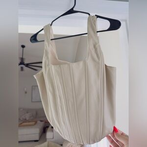 Beige Sleeveless Pleather Corset Crop Top from VICI